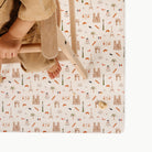 Paris@overhead of kid in a highchair on the mini mat