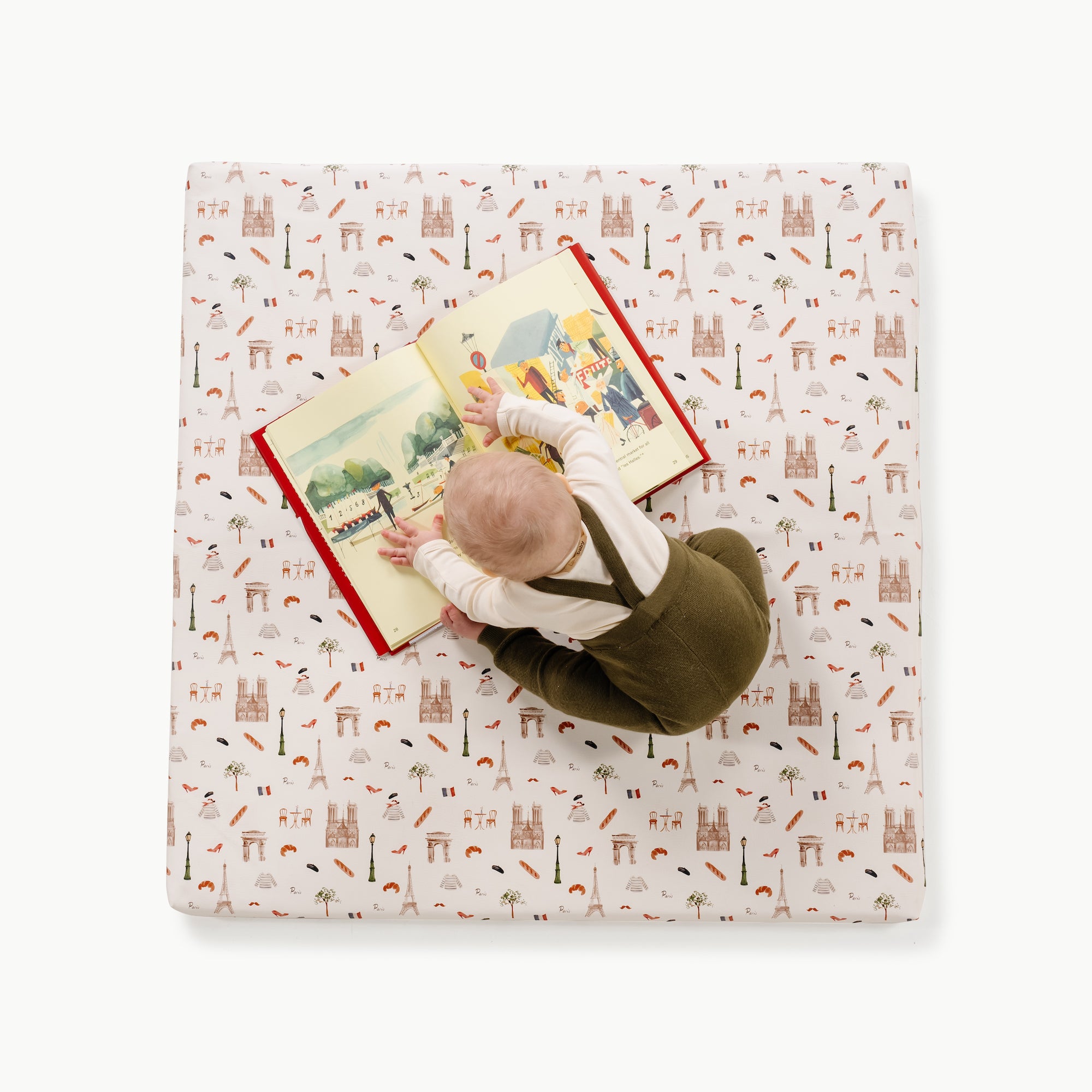 Paris / Square@overhead of kid playing on the paris padded square mat