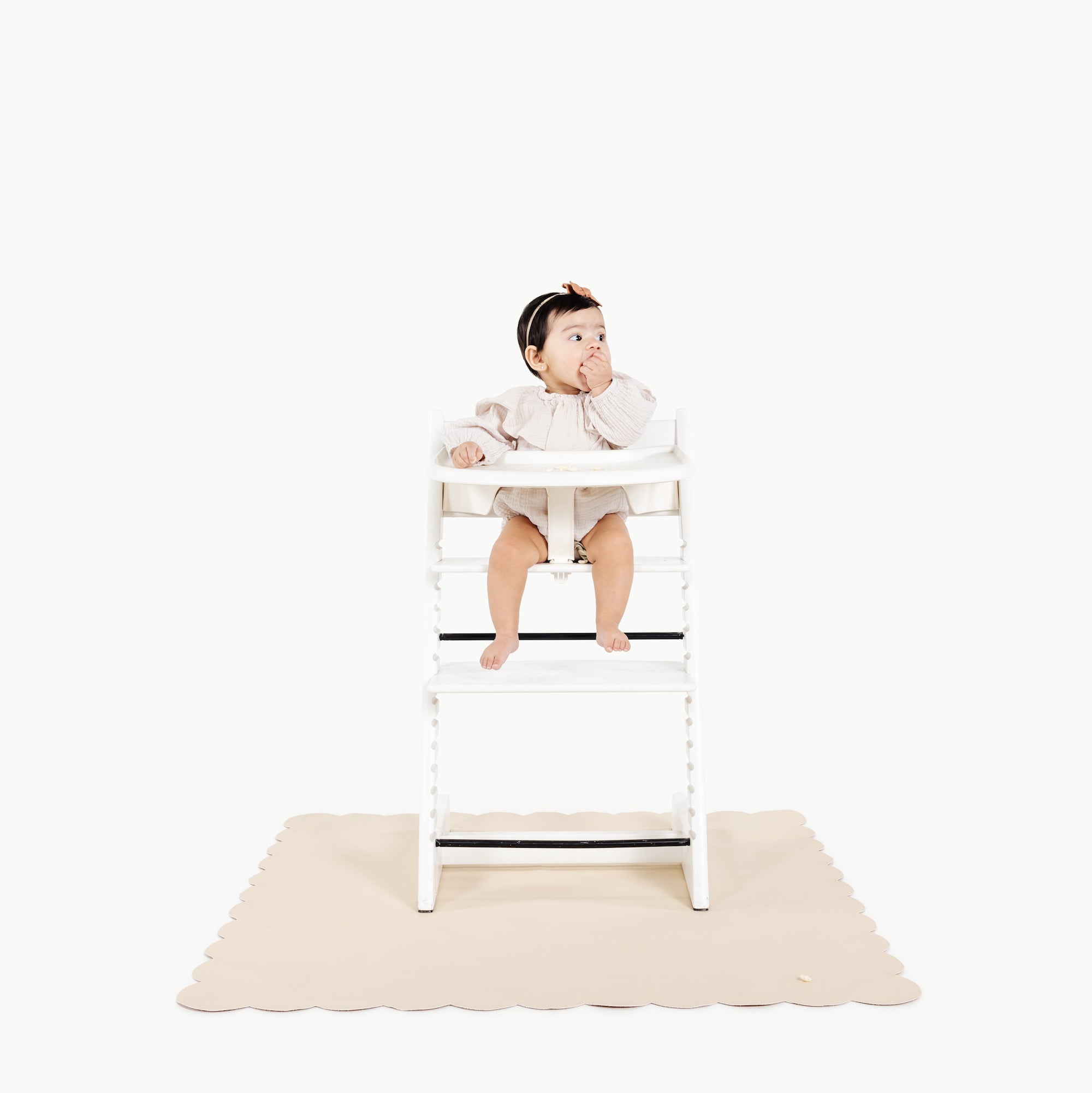 Petal Scallop (on sale)@baby in a highchair on the petal mini mat