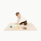 Petal Scallop (on sale)@kid playing on the petal mini mat