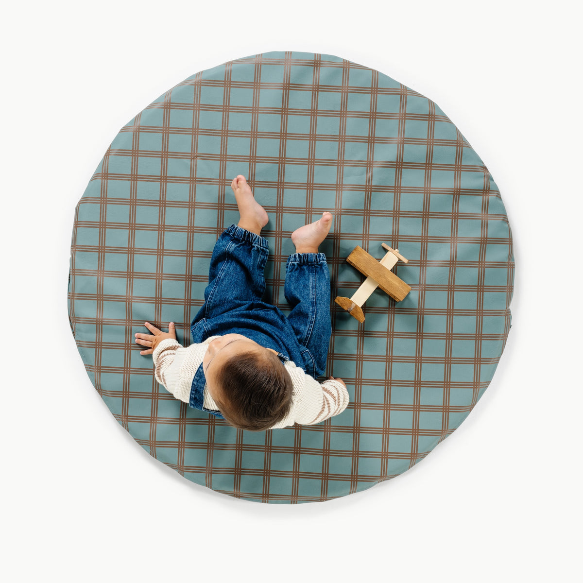 Rustic Plaid@overhead of little boy playing on padded mini