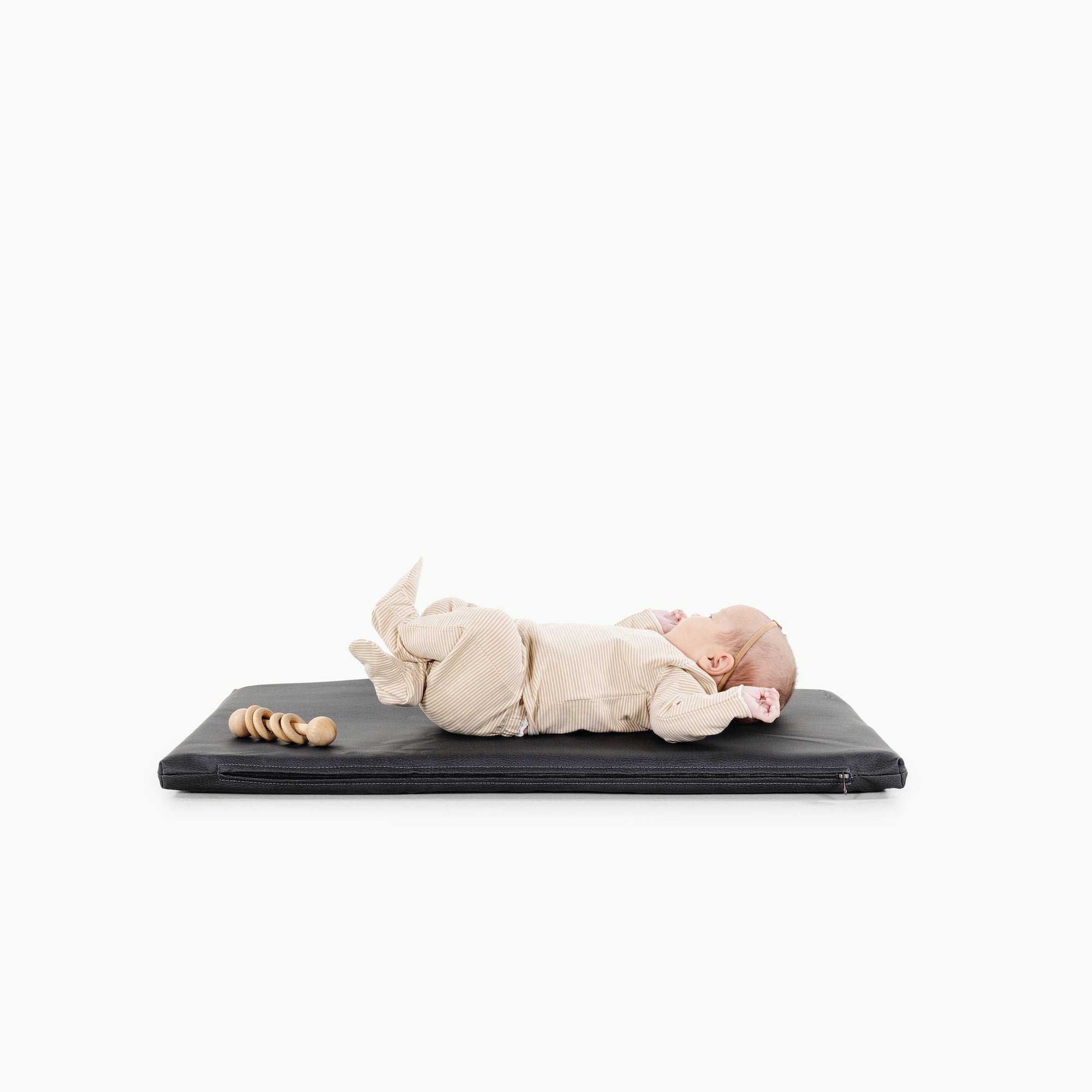 Raven (on sale)@baby laying on raven padded micro+