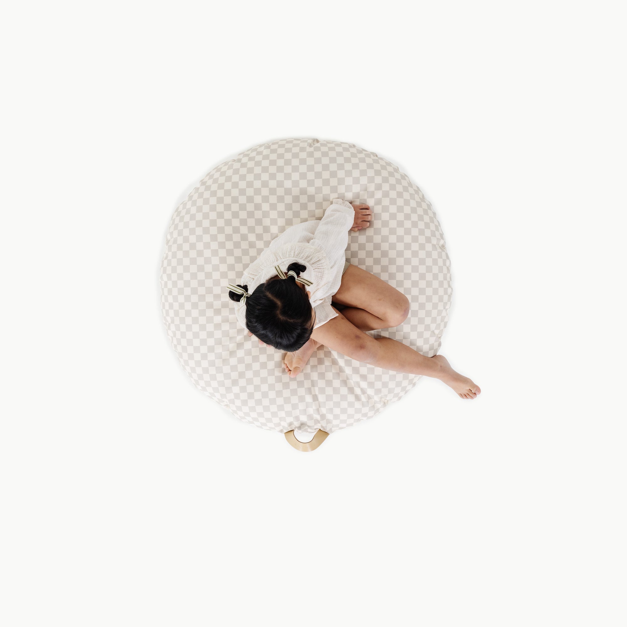 Rook (on sale) / Circle@overhead of girl sitting on cushion