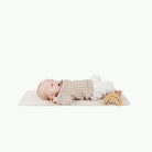 Rook (on sale)@baby laying on the rook micro+ mat