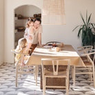 Wheat (on sale)@wheat tablecloth on table with family sitting at dining room table