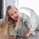 Wool (on sale)@Girl crawling through wool tunnel