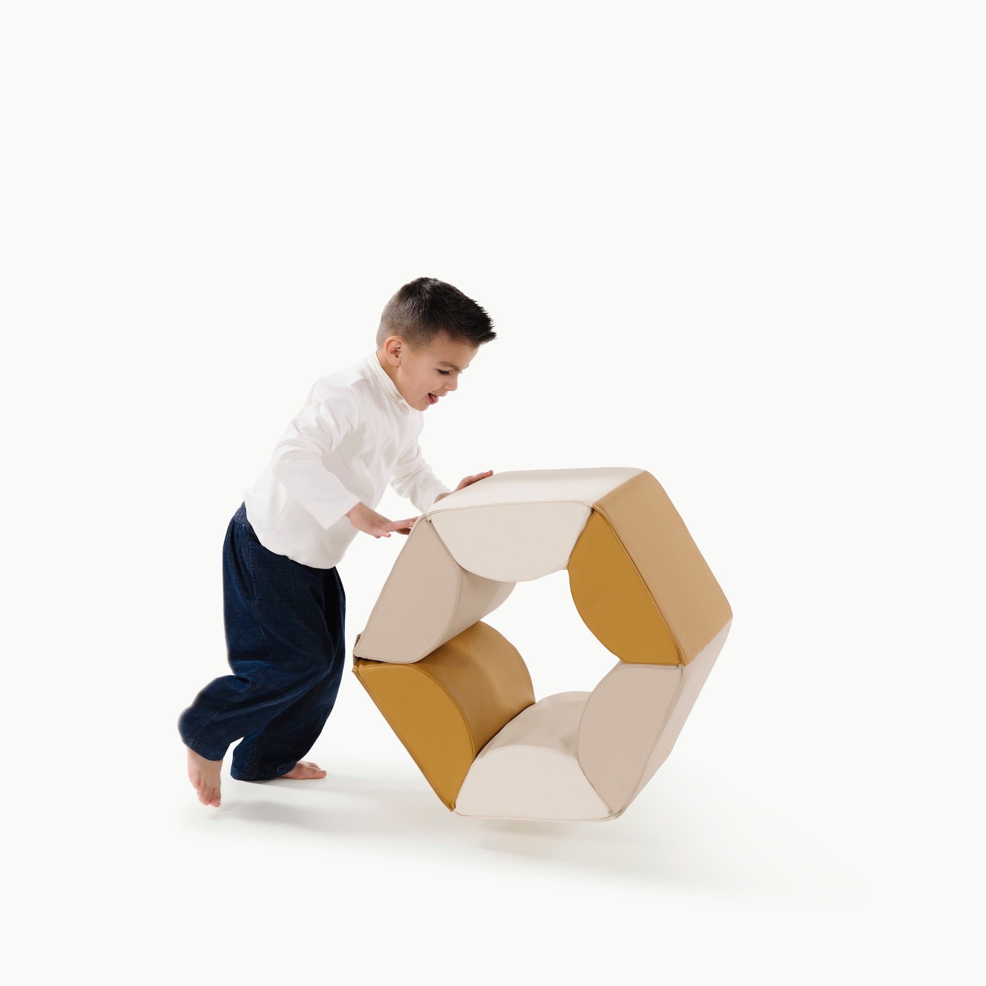 Ivory • Millet • Saffron@little boy playing with the hex hopper