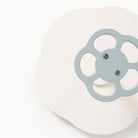 Harbor@close up of the sit and spin, with blue handle and white base