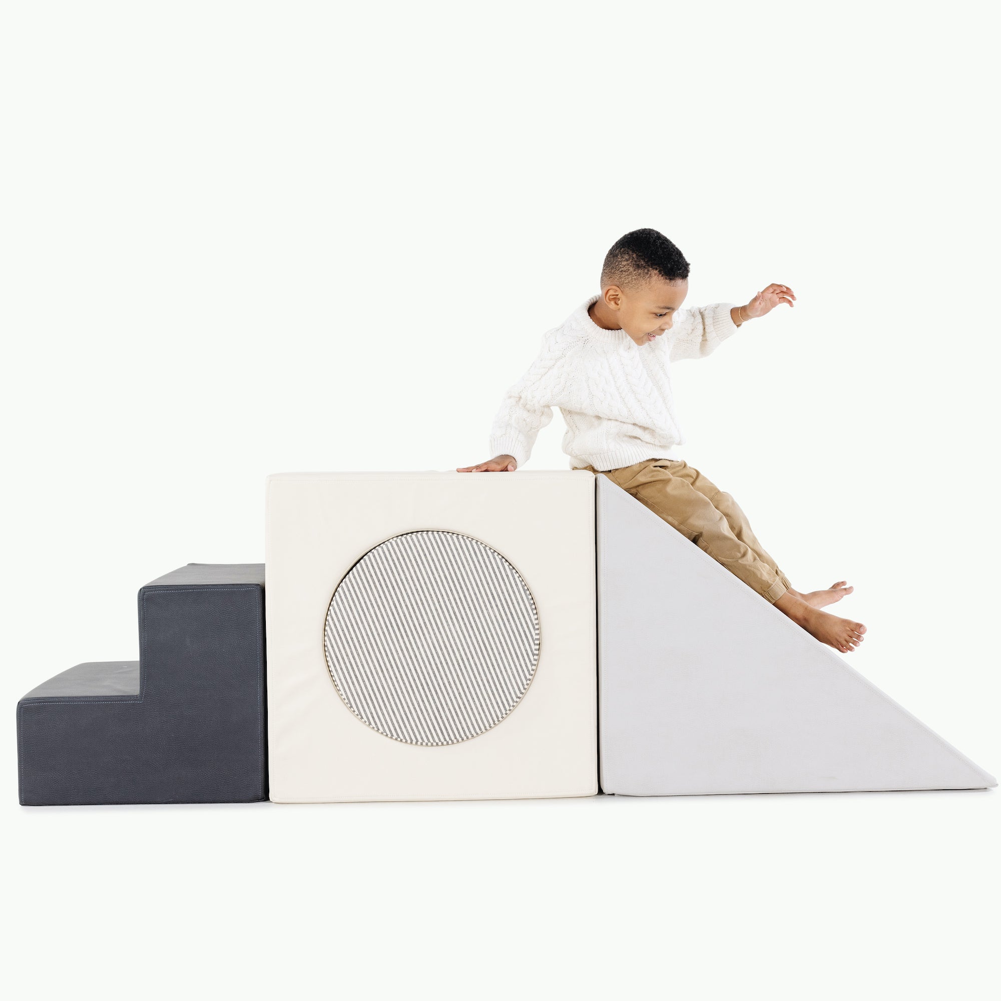 Raven • Ivory • Stone Stripe • Gull@Kid playing on the Stone Stripe Block Playset
