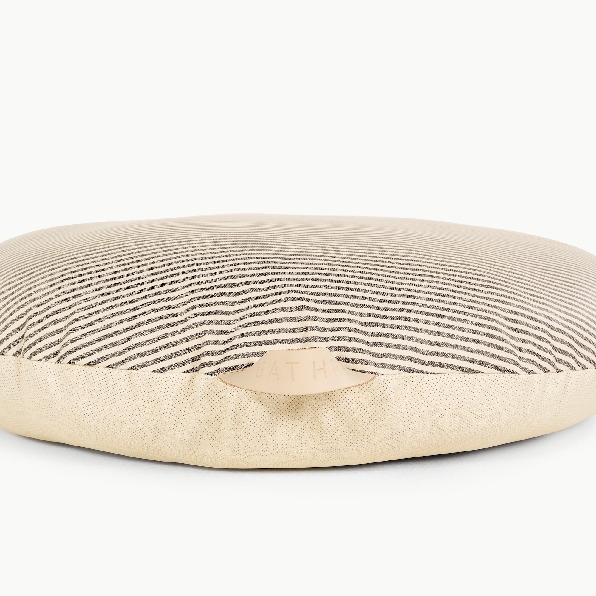 Stone Stripe / Circle@handle detail of the Stone Stripe Circle Floor Cushion