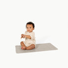 Stone Stripe@Baby sitting on the Stone Stripe Micro+ Mat