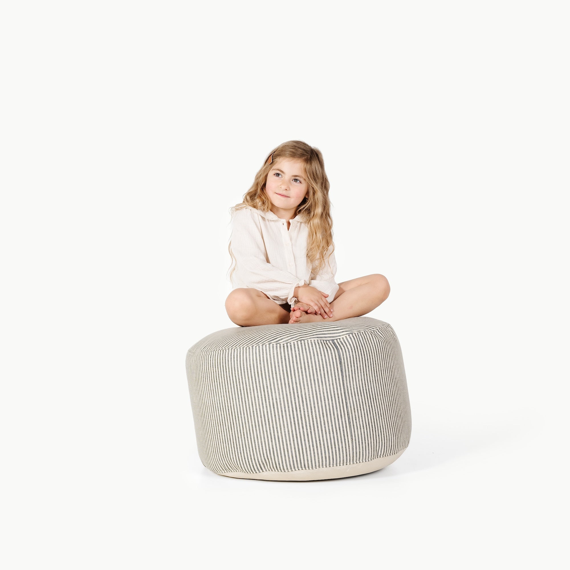 Stone Stripe@Little girl sitting on Stone Stripe Circle Pouf