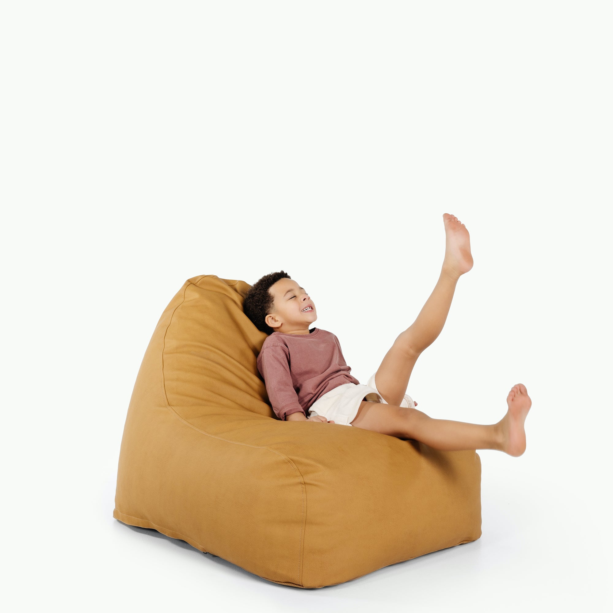 Tassel (on sale)@little boy sitting on lounger