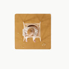 Tassel (on sale)@overhead of baby in high chair on mat