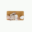 Tassel (on sale)@overhead of baby laying on the tassel micro+ mat