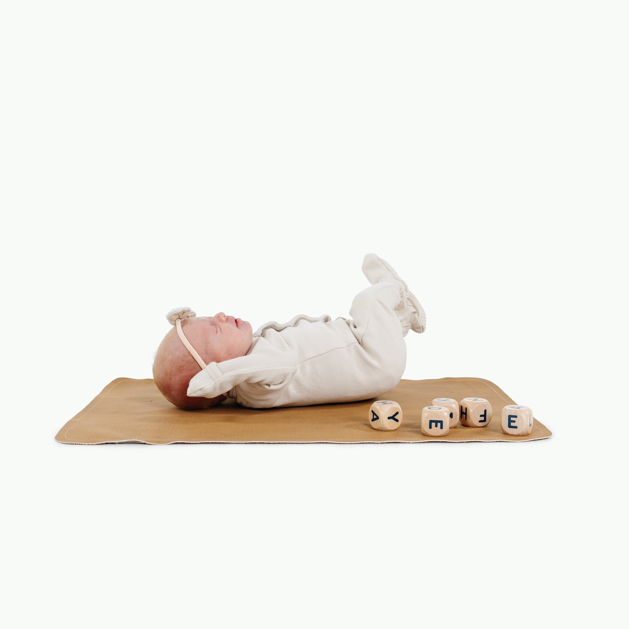 Tassel (on sale)@baby laying on the tassel micro mat