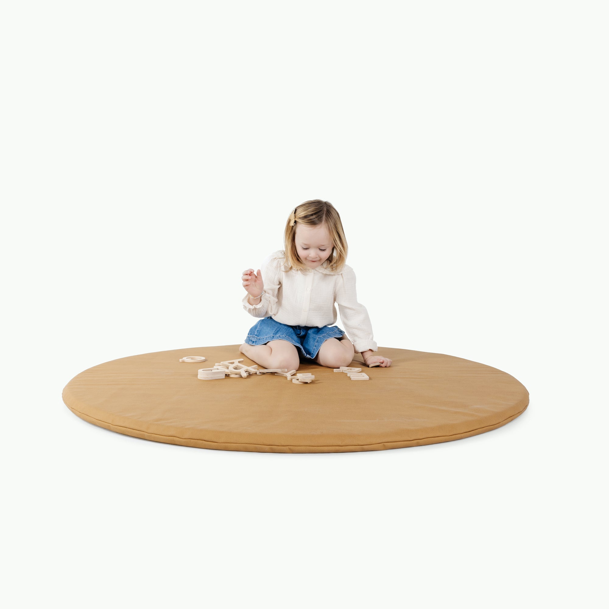 Tassel (on sale)@little girl playing on padded mat