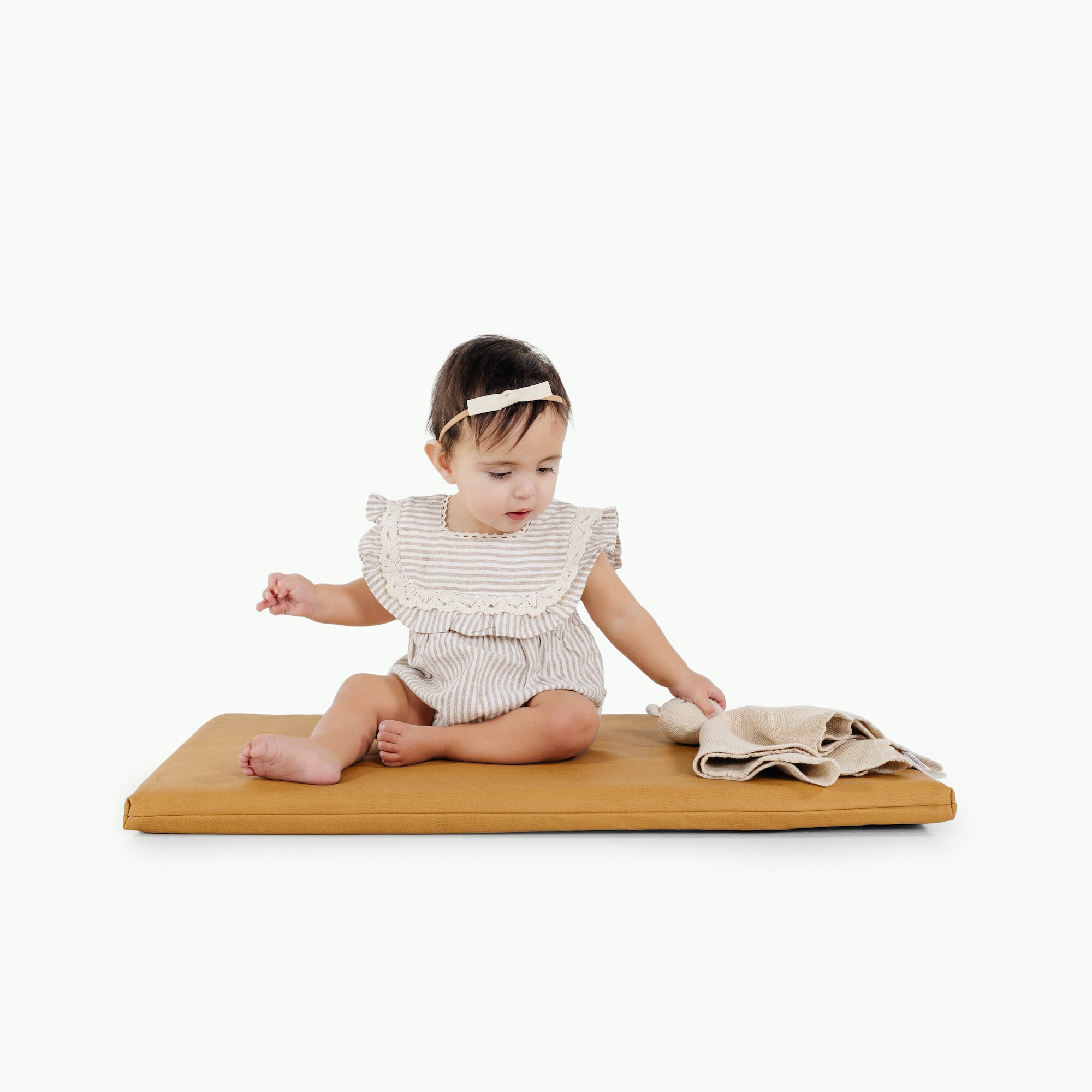 Tassel (on sale)@little girl playing on padded mat