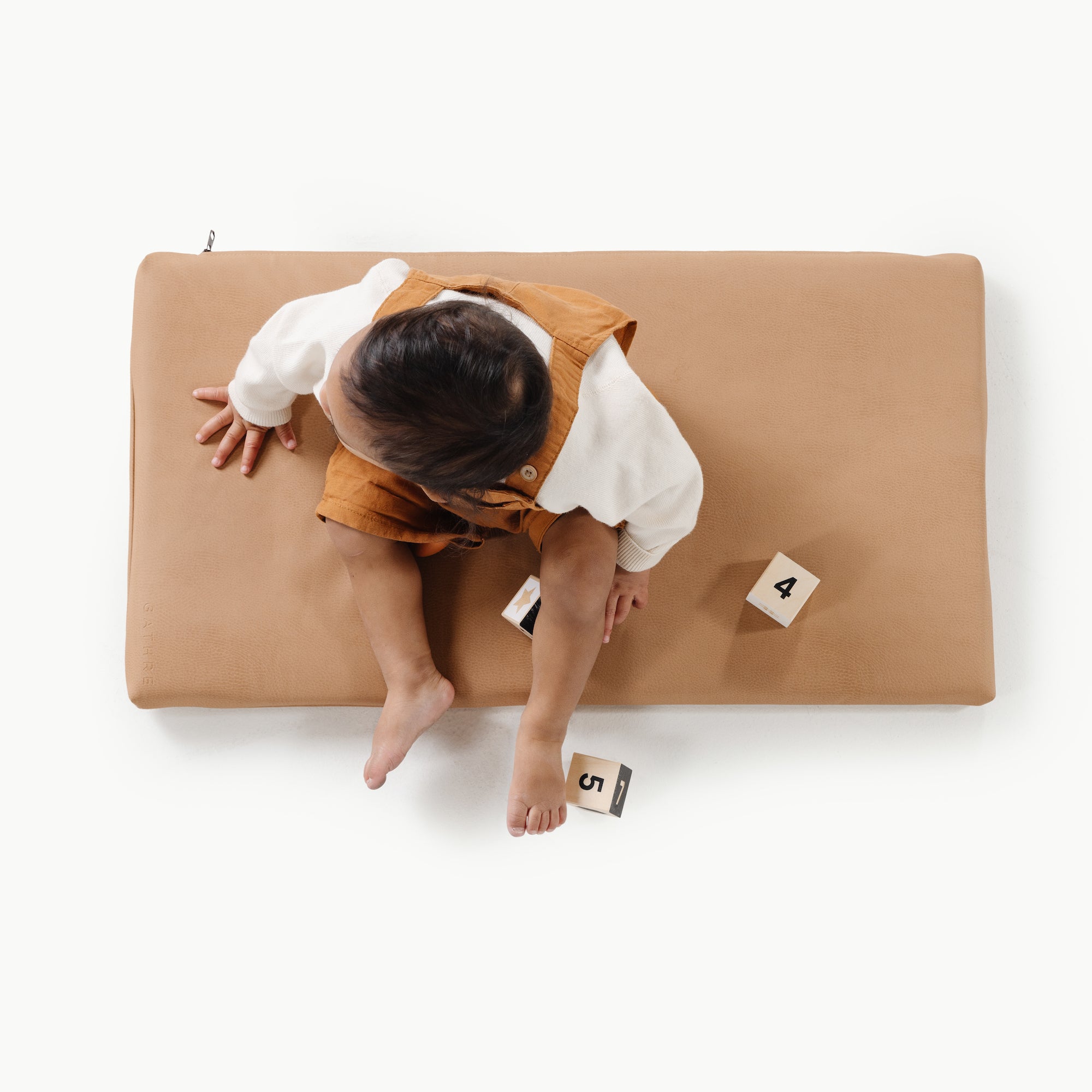 Terra (on sale)@Overhead of baby sitting on the Terra Padded Micro+