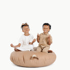 Terra (on sale) / Circle@Kids sitting on the Terra Circle Floor Cushion