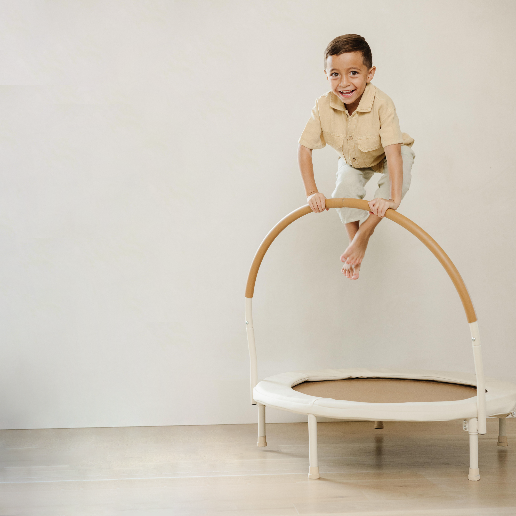 Kid jumping on the Trampoline.