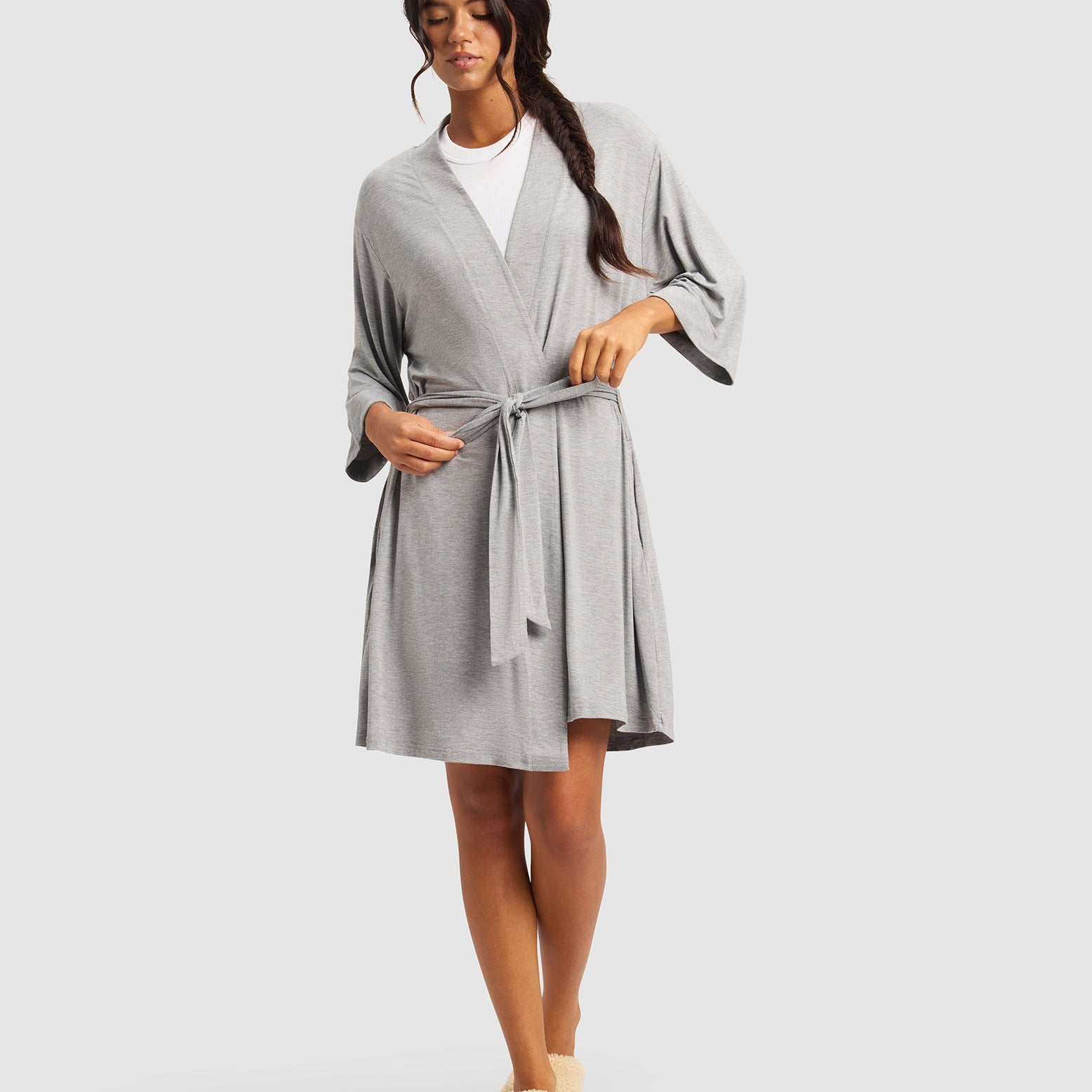 Grey@woman wearing a grey cozy earth robe