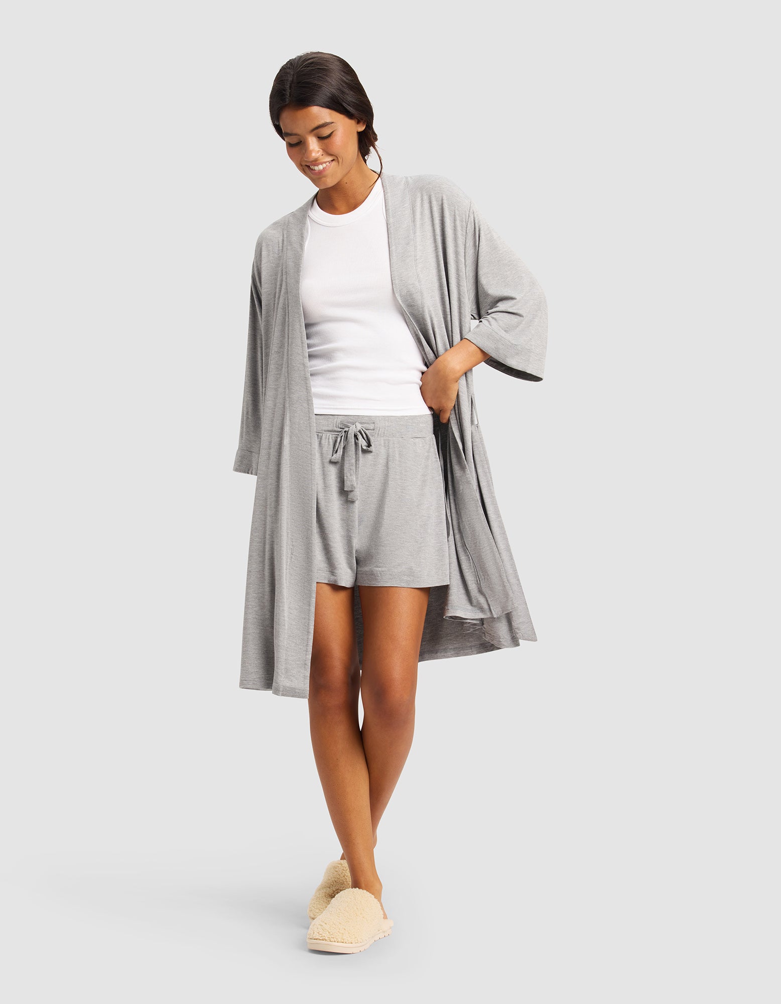 Grey@woman wearing a grey cozy earth robe