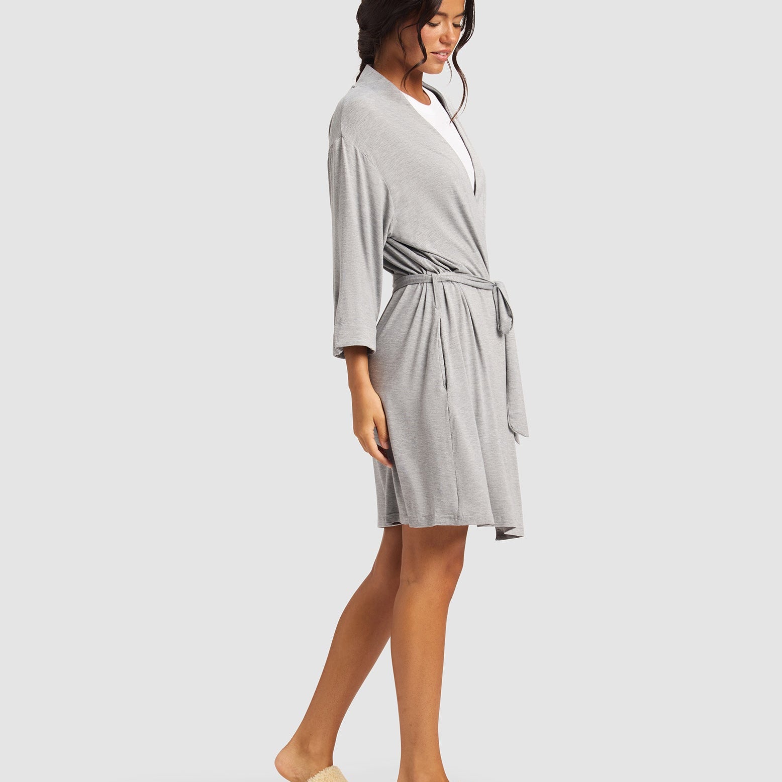 Grey@woman wearing a grey cozy earth robe