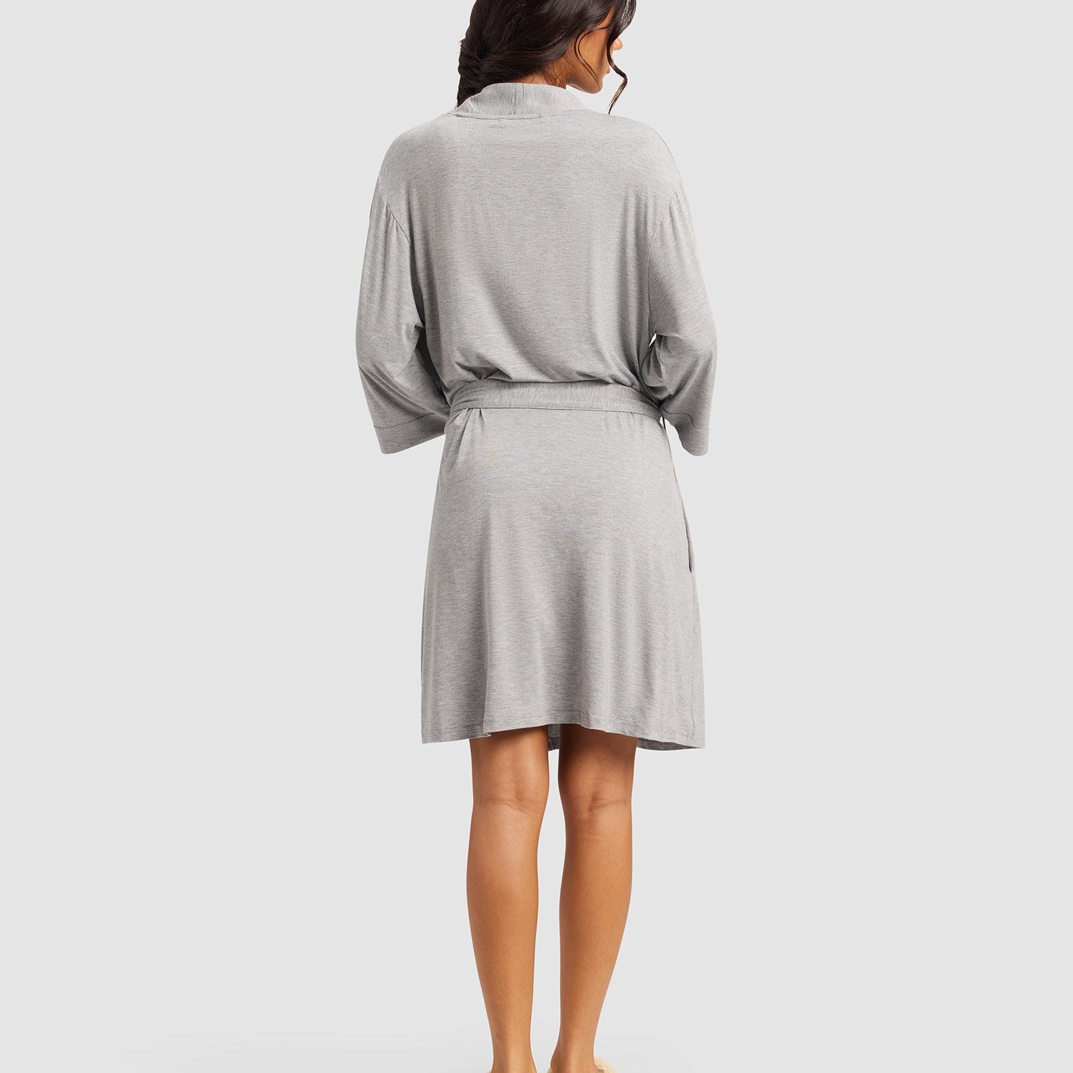 Grey@woman wearing a grey cozy earth robe