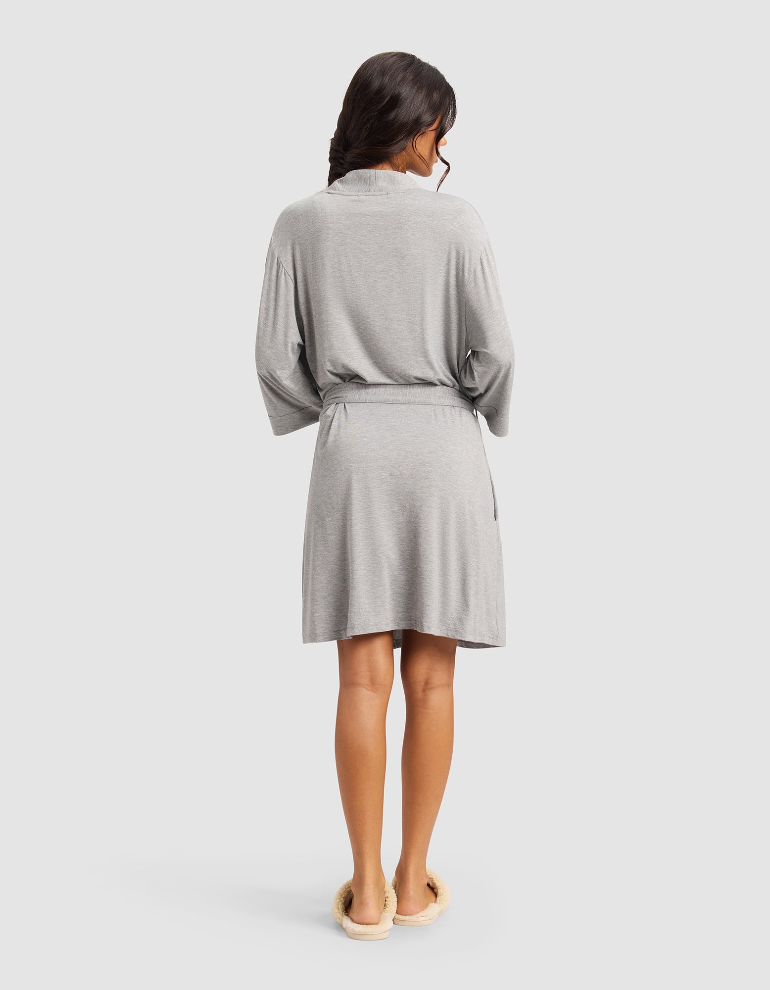 Grey@woman wearing a grey cozy earth robe