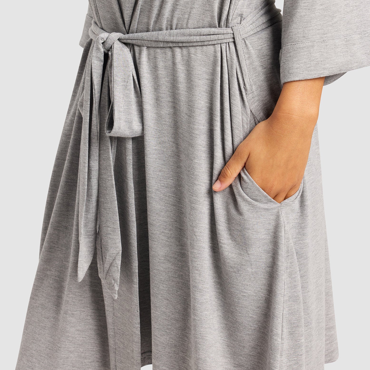 Grey@woman wearing a grey cozy earth robe