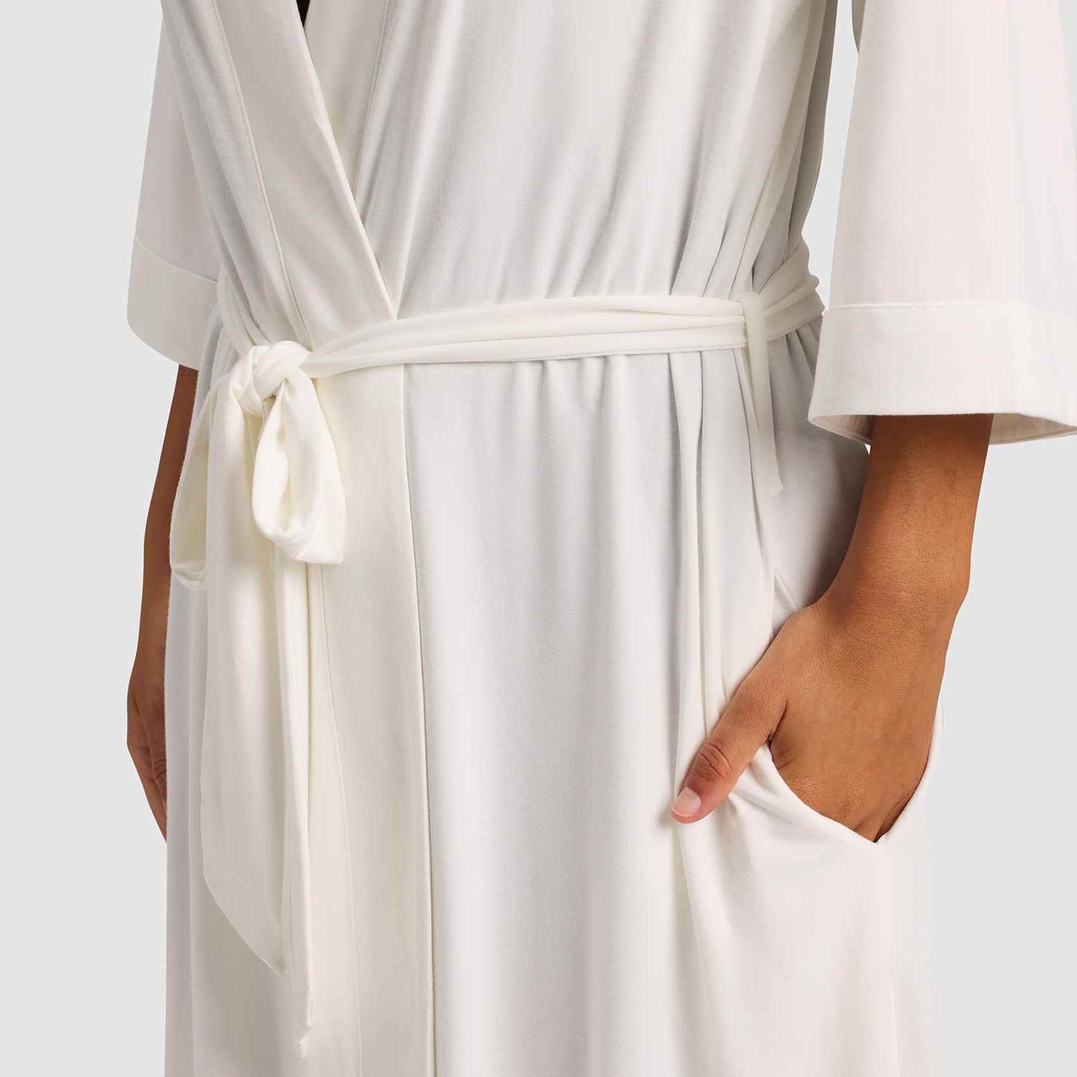 Ivory@woman wearing a Ivory cozy earth robe