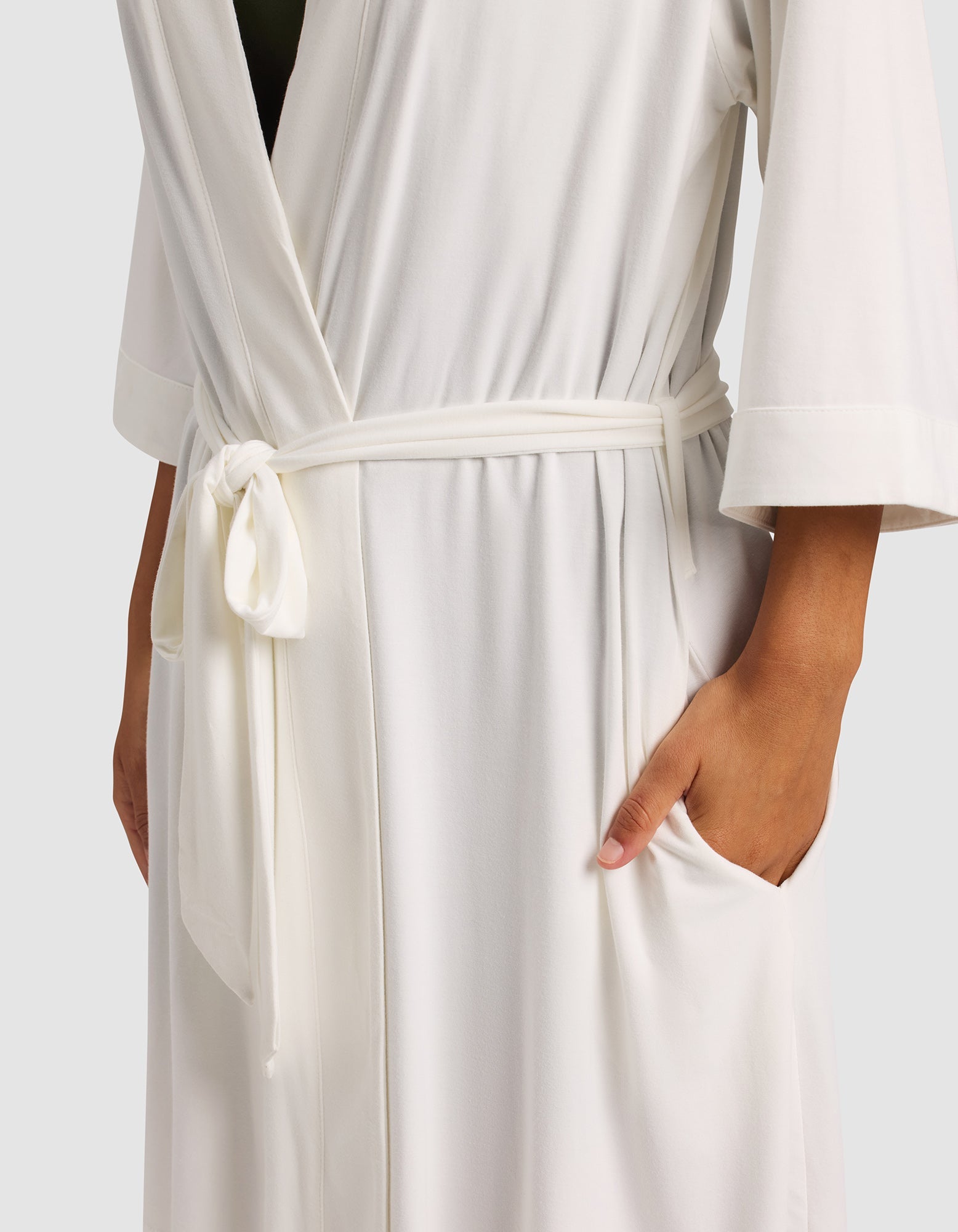 Ivory@woman wearing a Ivory cozy earth robe