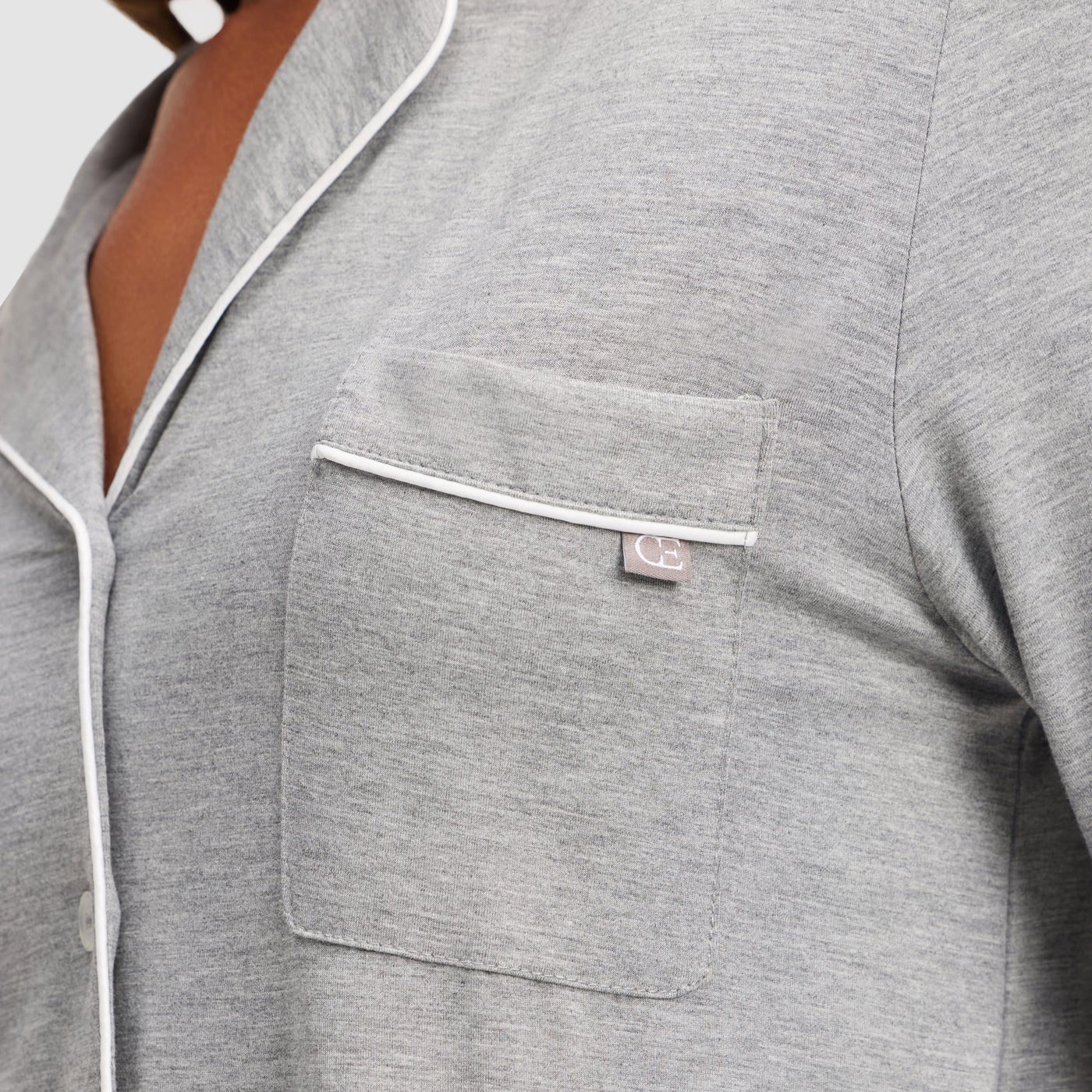 Grey@woman wearing grey cozy earth pajamas