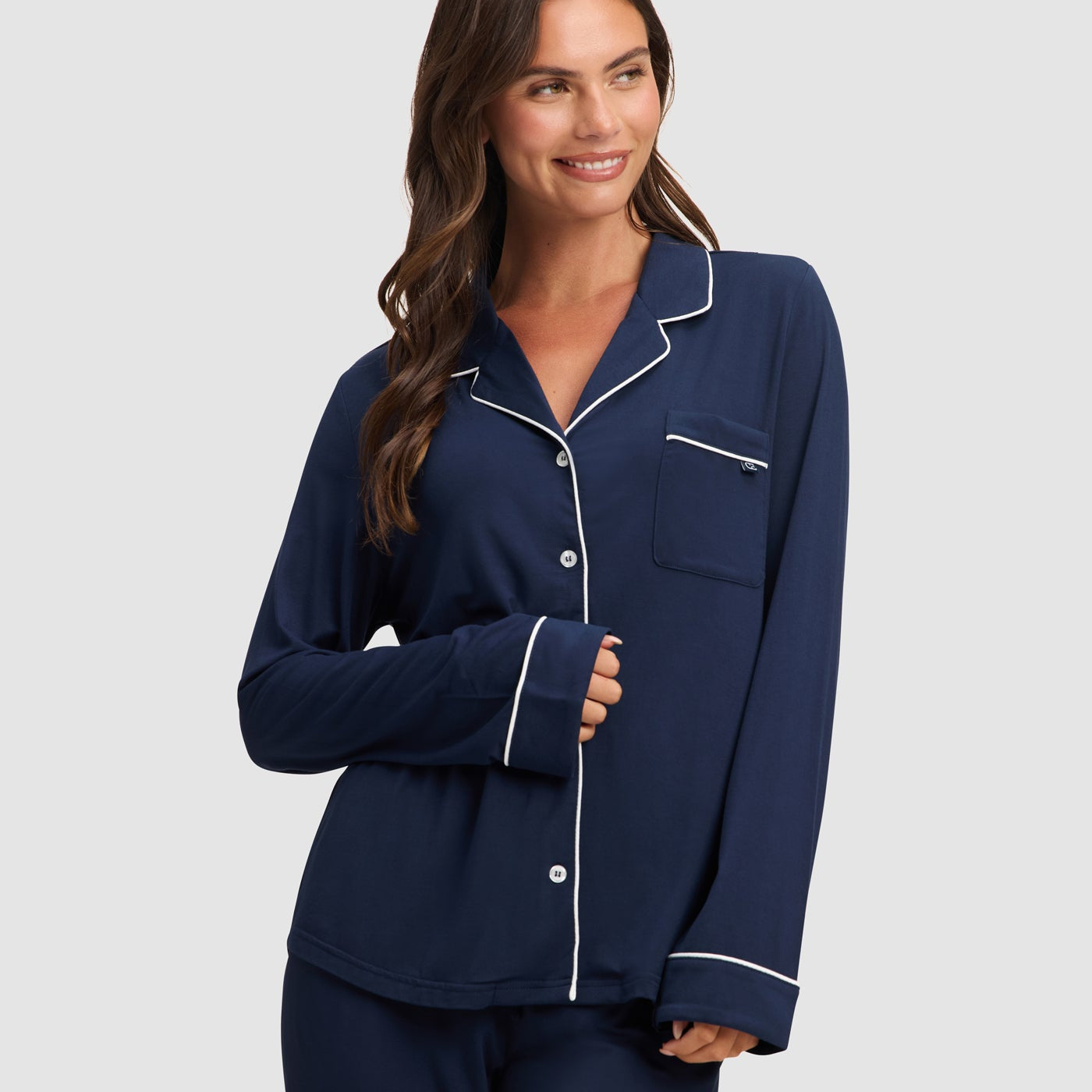 Navy@woman wearing navy cozy earth pajamas