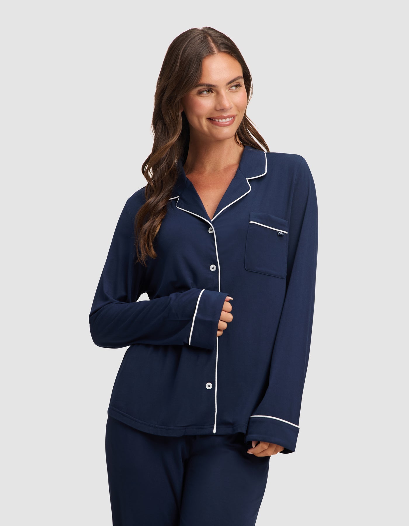 Navy@woman wearing navy cozy earth pajamas