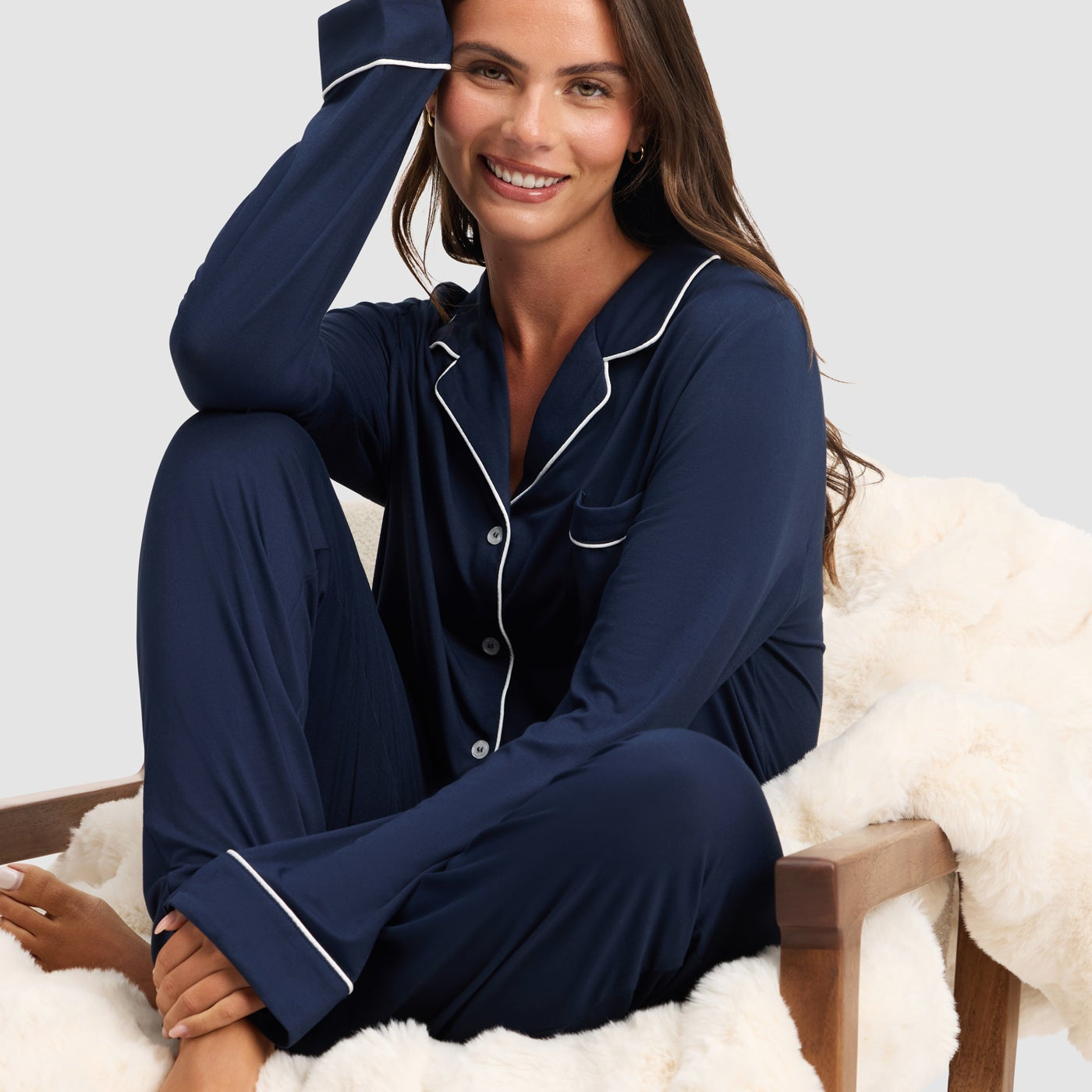 Navy@woman wearing navy cozy earth pajamas