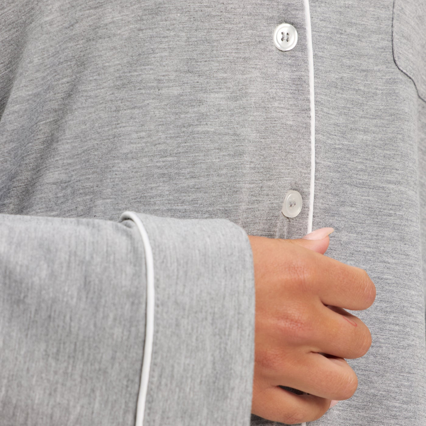 Grey@woman wearing grey cozy earth pajamas