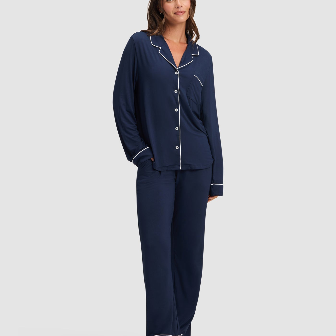 Navy@woman wearing navy cozy earth pajamas