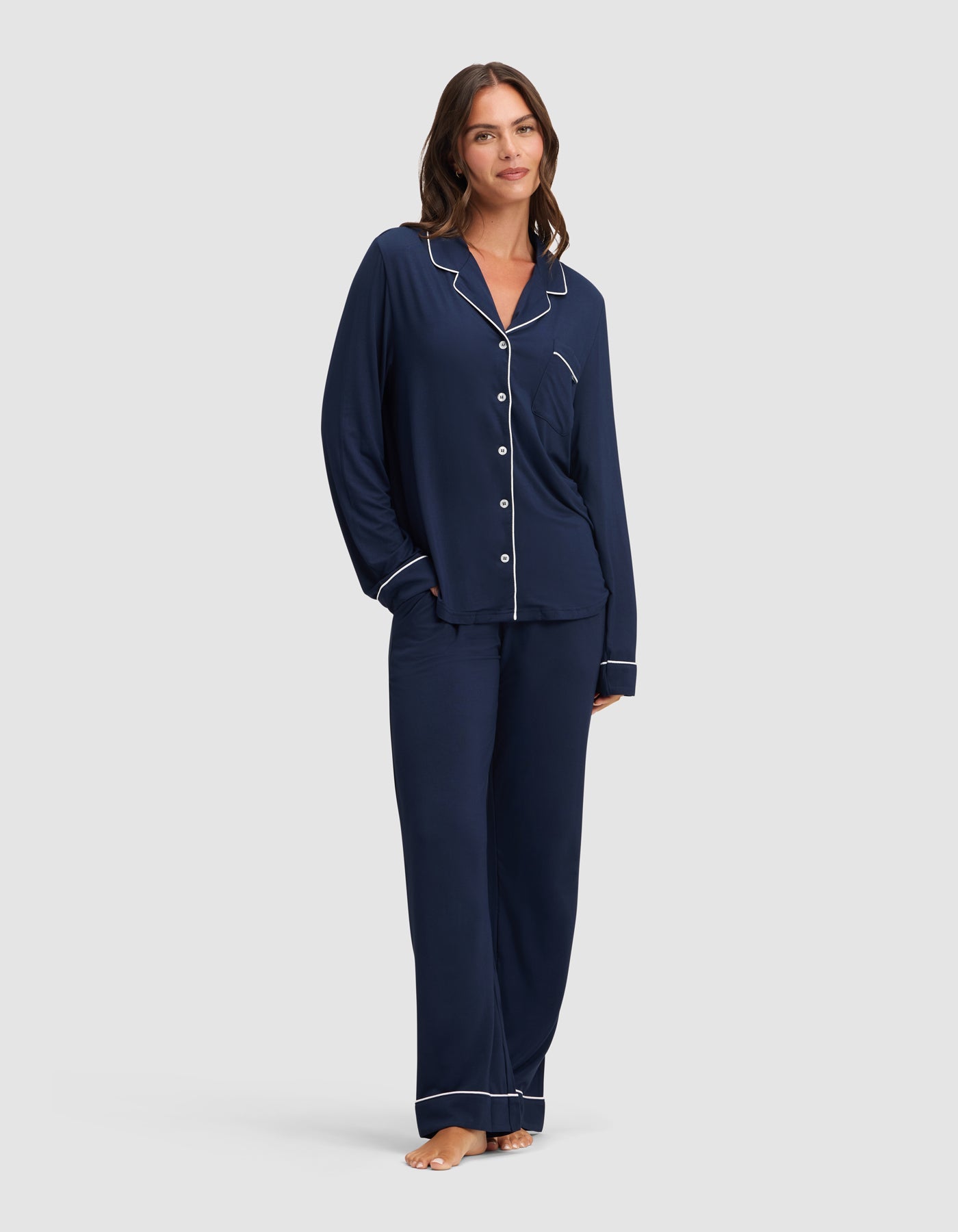 Navy@woman wearing navy cozy earth pajamas