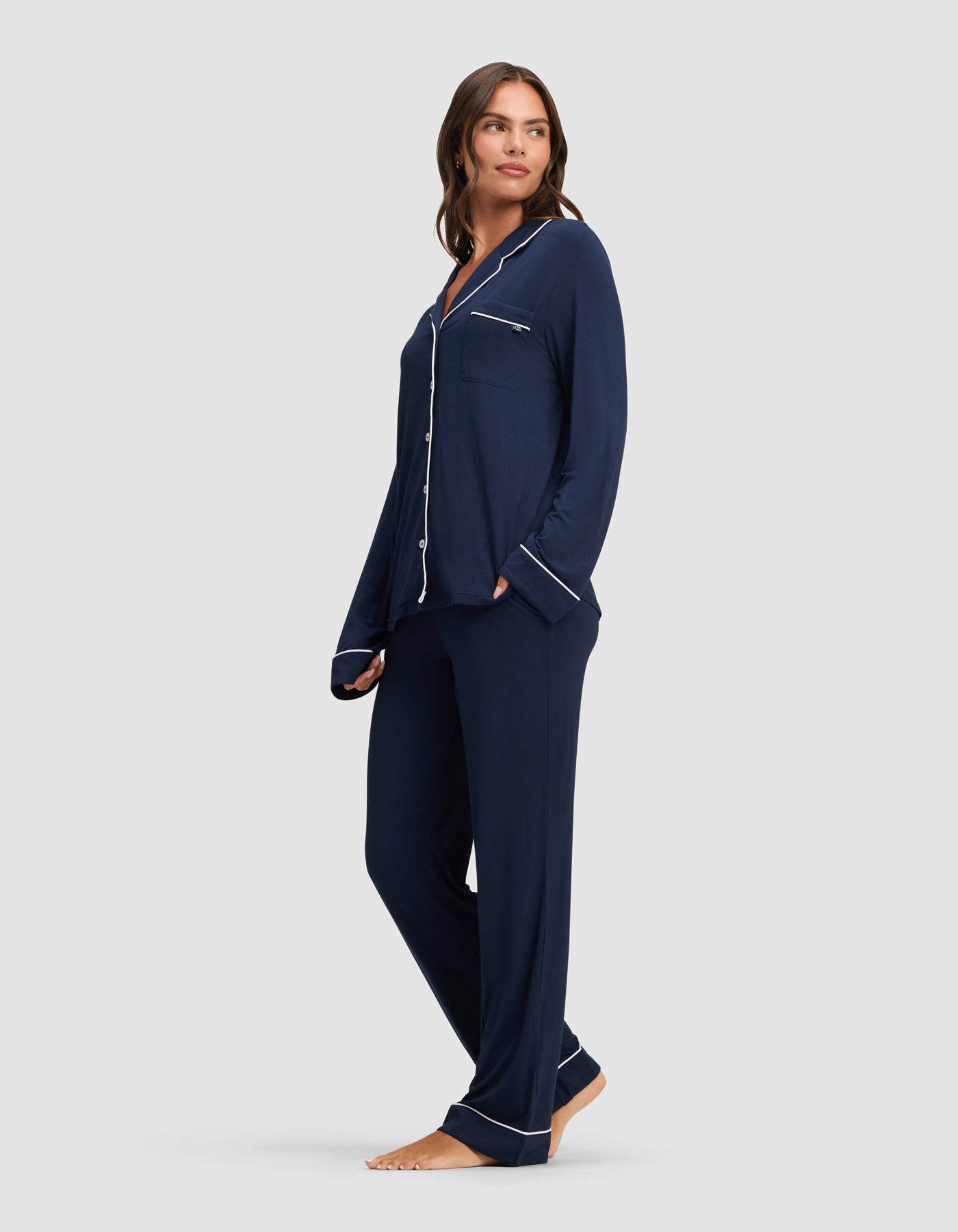 Navy@woman wearing navy cozy earth pajamas