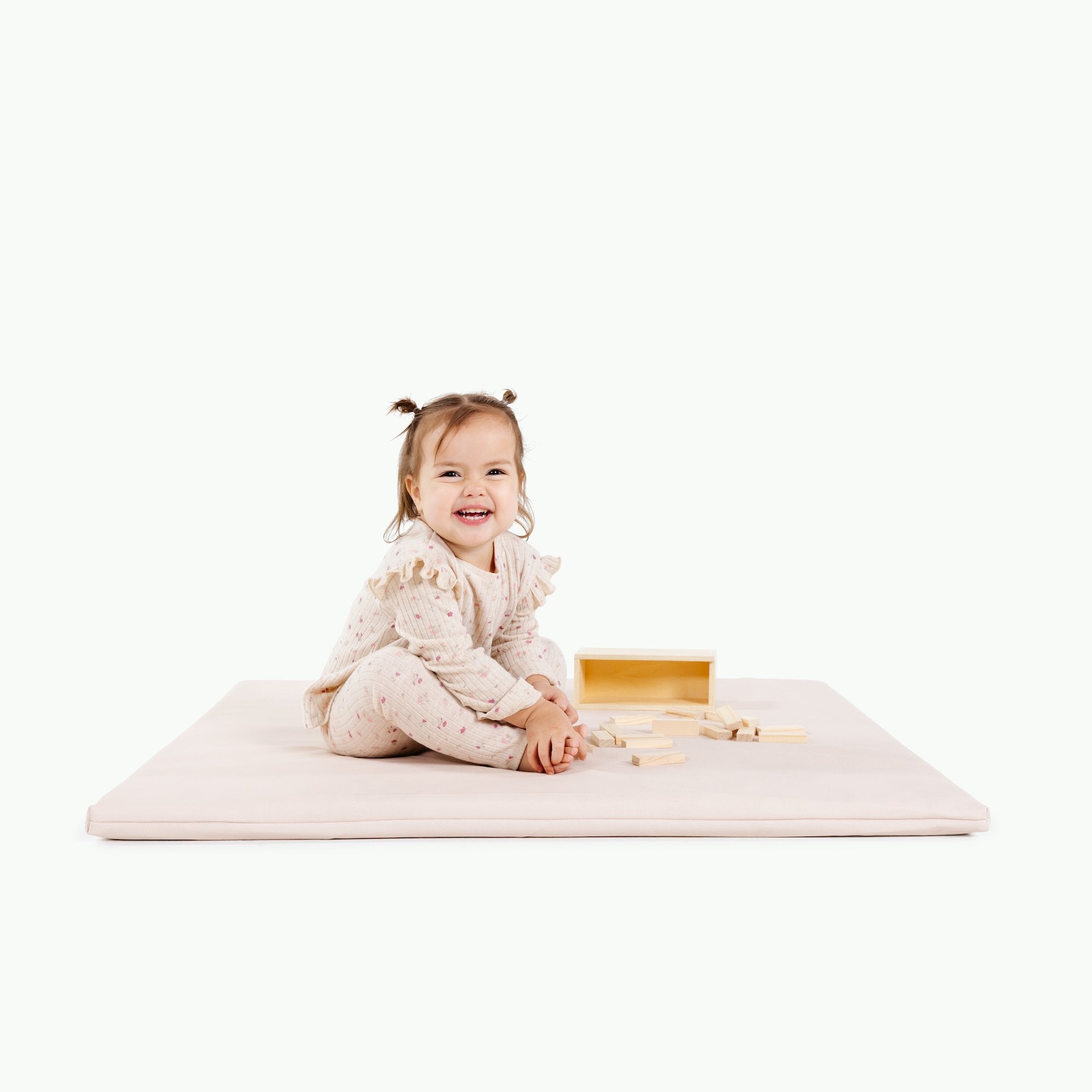 Belle / Square@Girl sitting on Belle Padded Mini Square