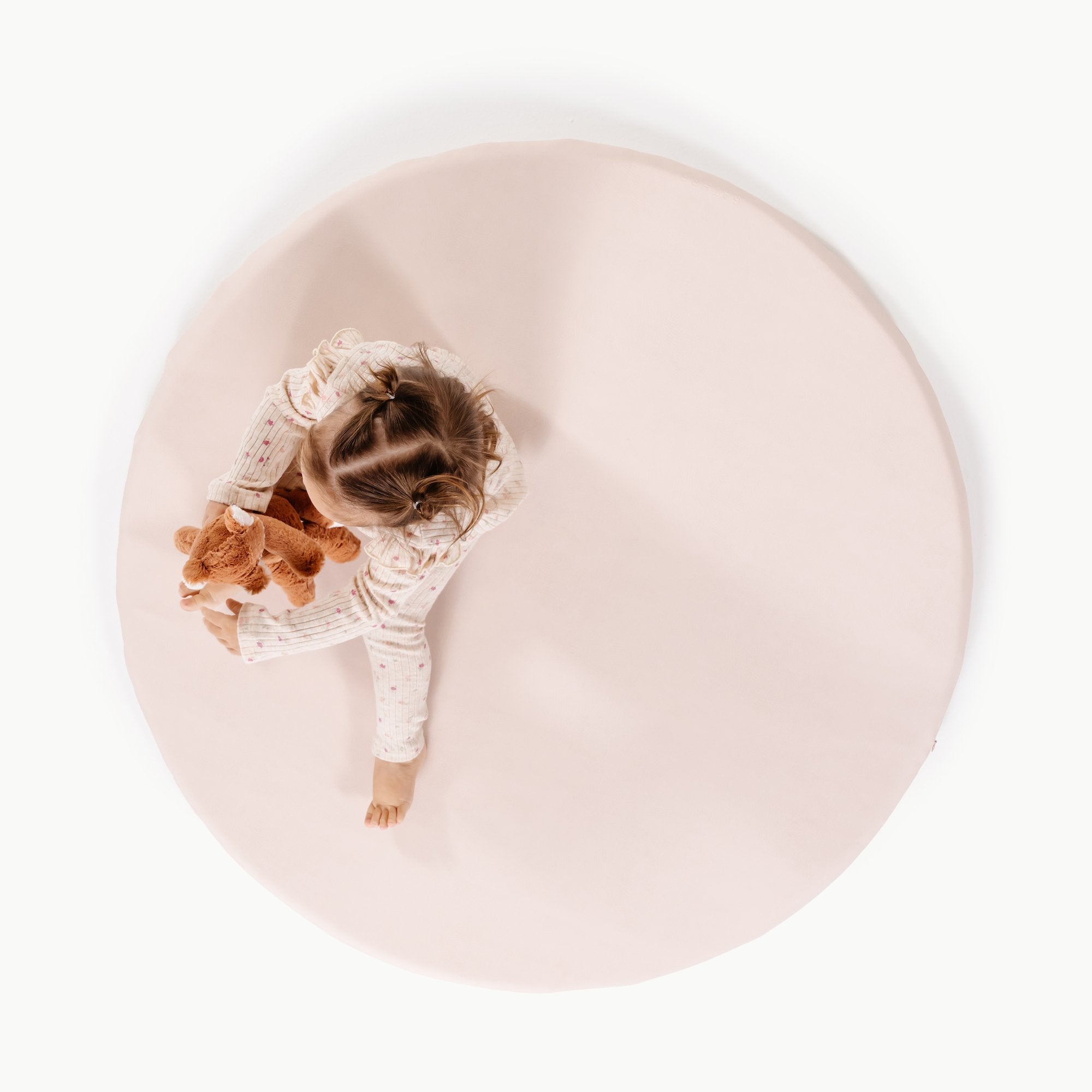 Belle / Circle@Overhead of girl sitting on Belle Padded Mini circle