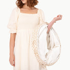 Bloom (on sale)@Woman holding bloom tunnel