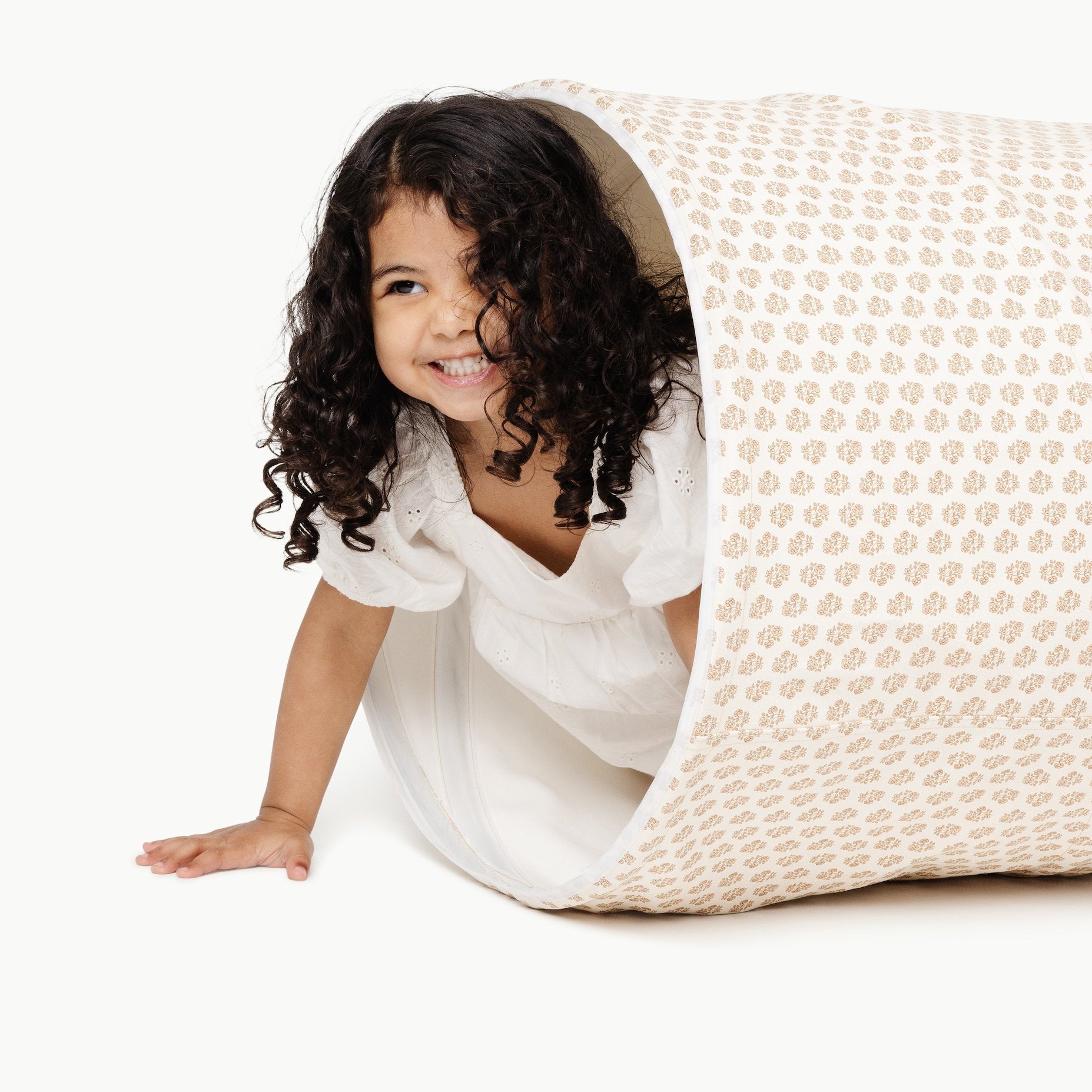 Bloom (on sale)@girl crawling through bloom tunnel