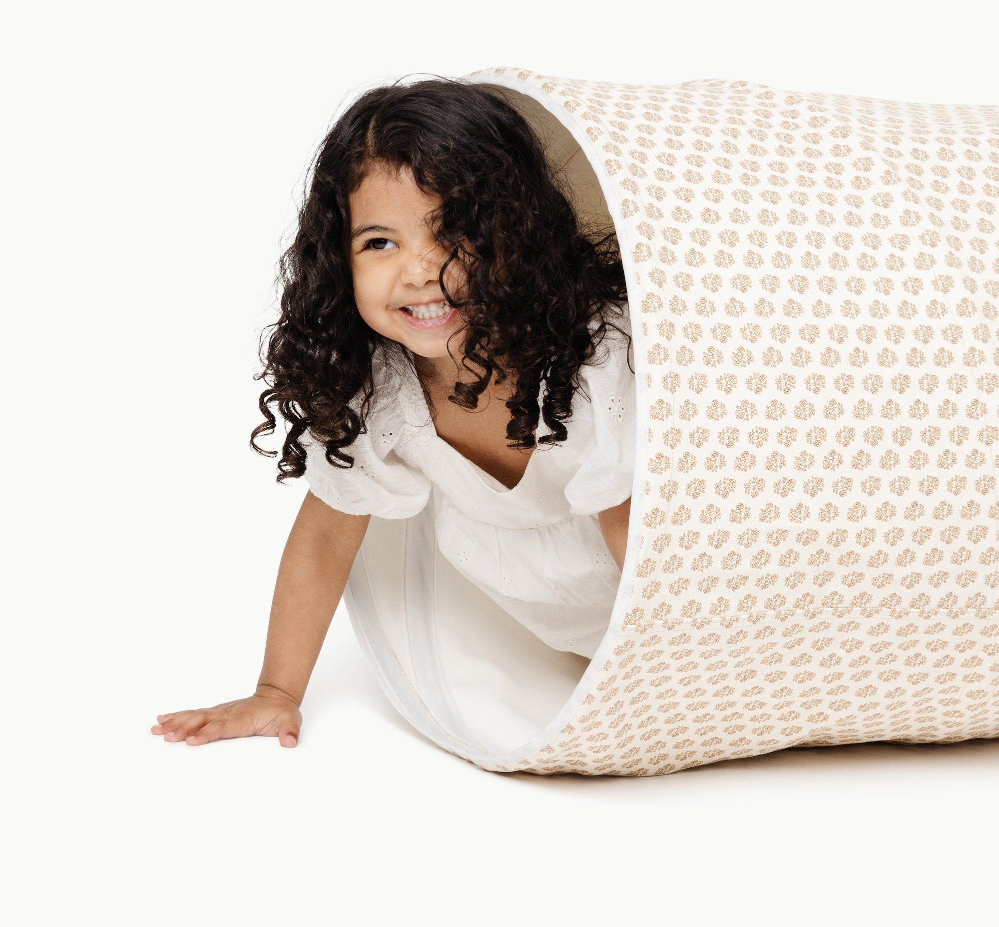 Bloom (on sale)@girl crawling through bloom tunnel