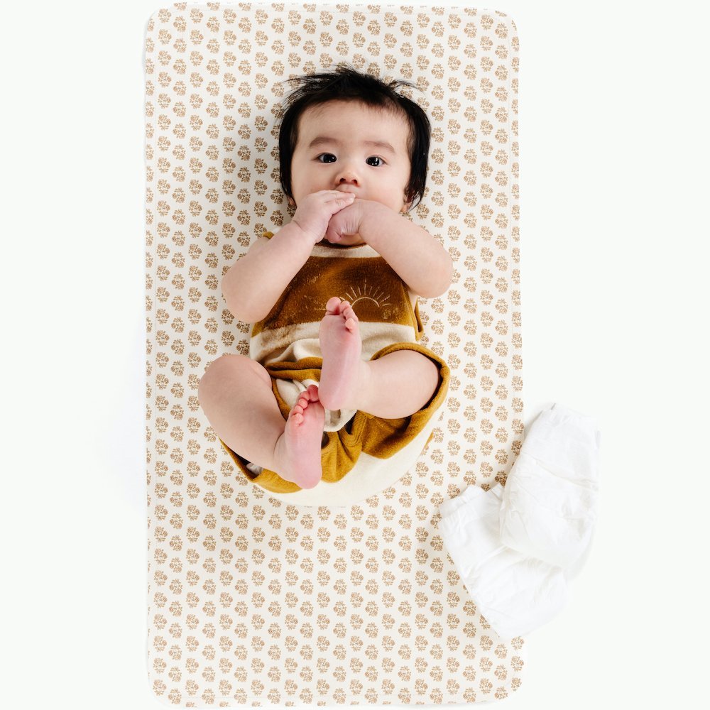Bloom (on sale)@Overhead of baby laying on the Bloom Micro+ Mat