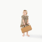 Camel@Little kid holding the small camel caddy