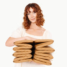 Camel@Woman holding the folded up Camel Ball Pit