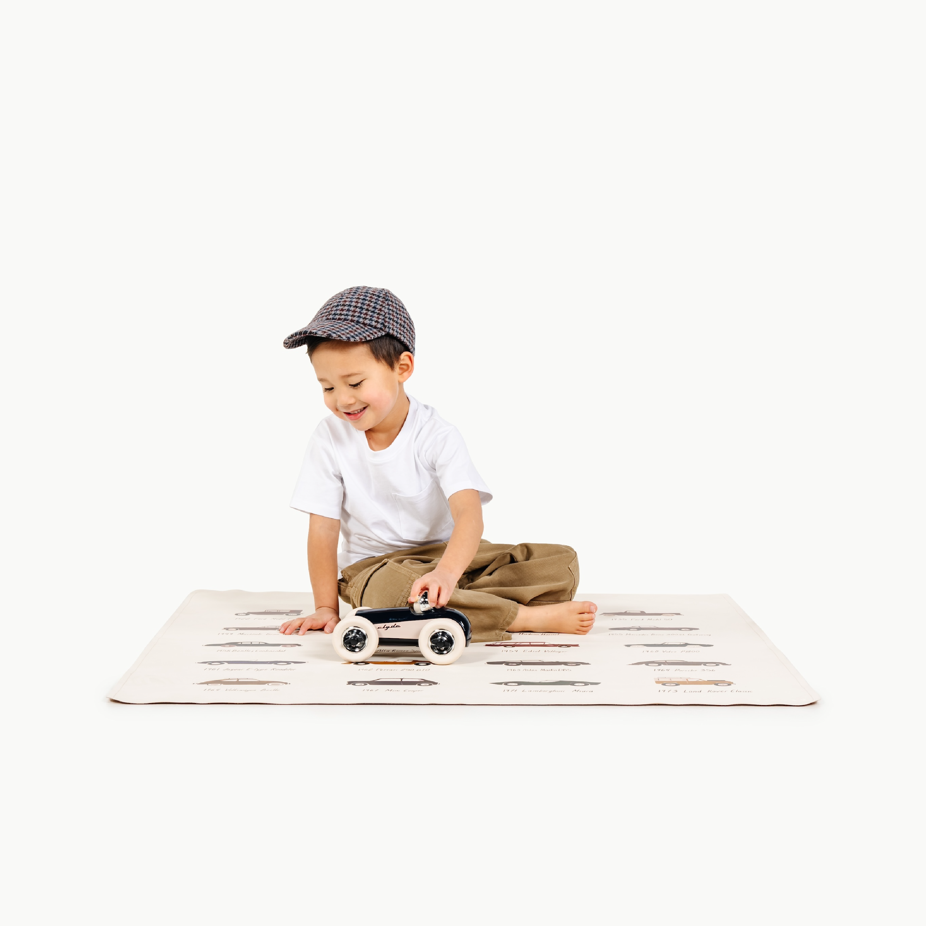 Classic Cars@little boy playing on a mini mat